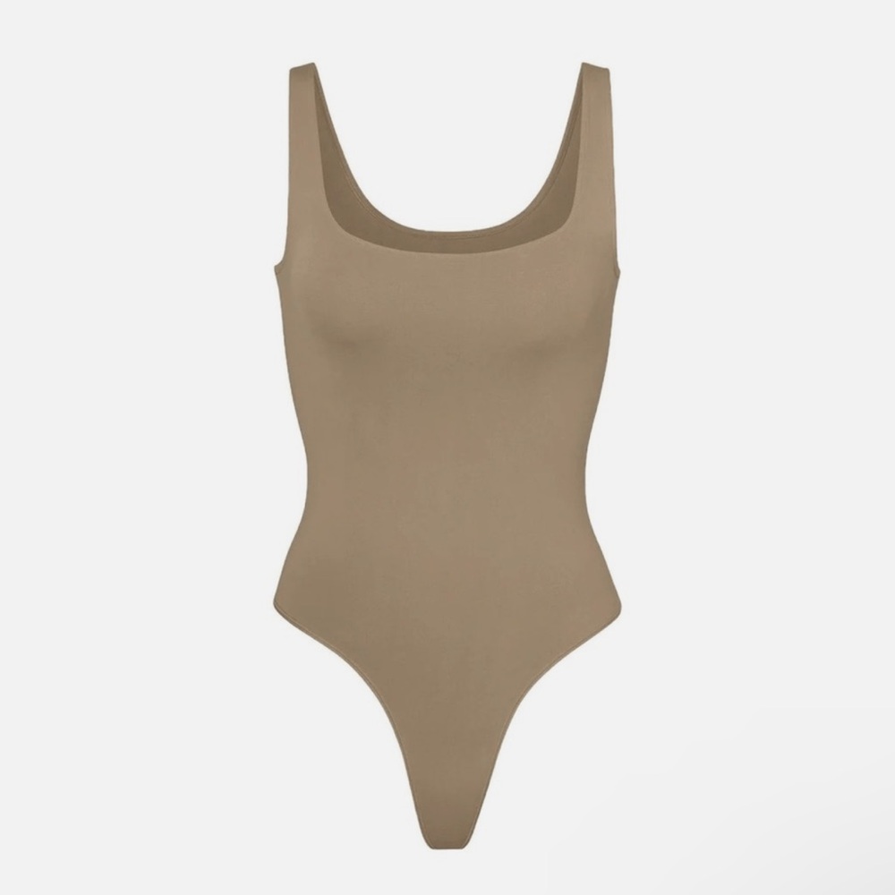 SKIMS Soft Smoothing Seamless Thong Bodysuit in Desert